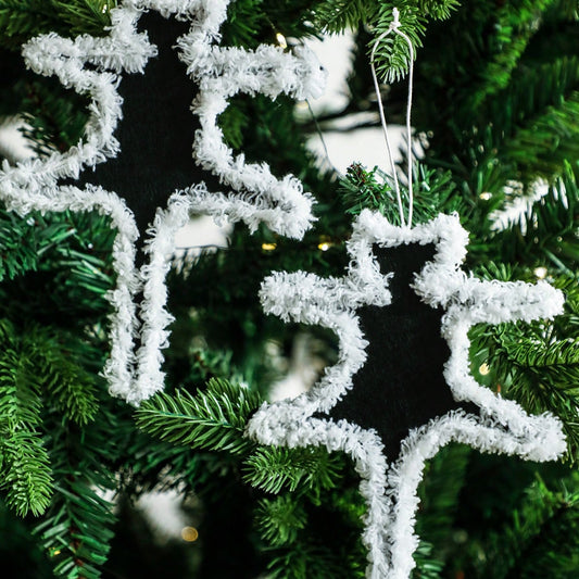 fluffy black cat ornament - styled photo