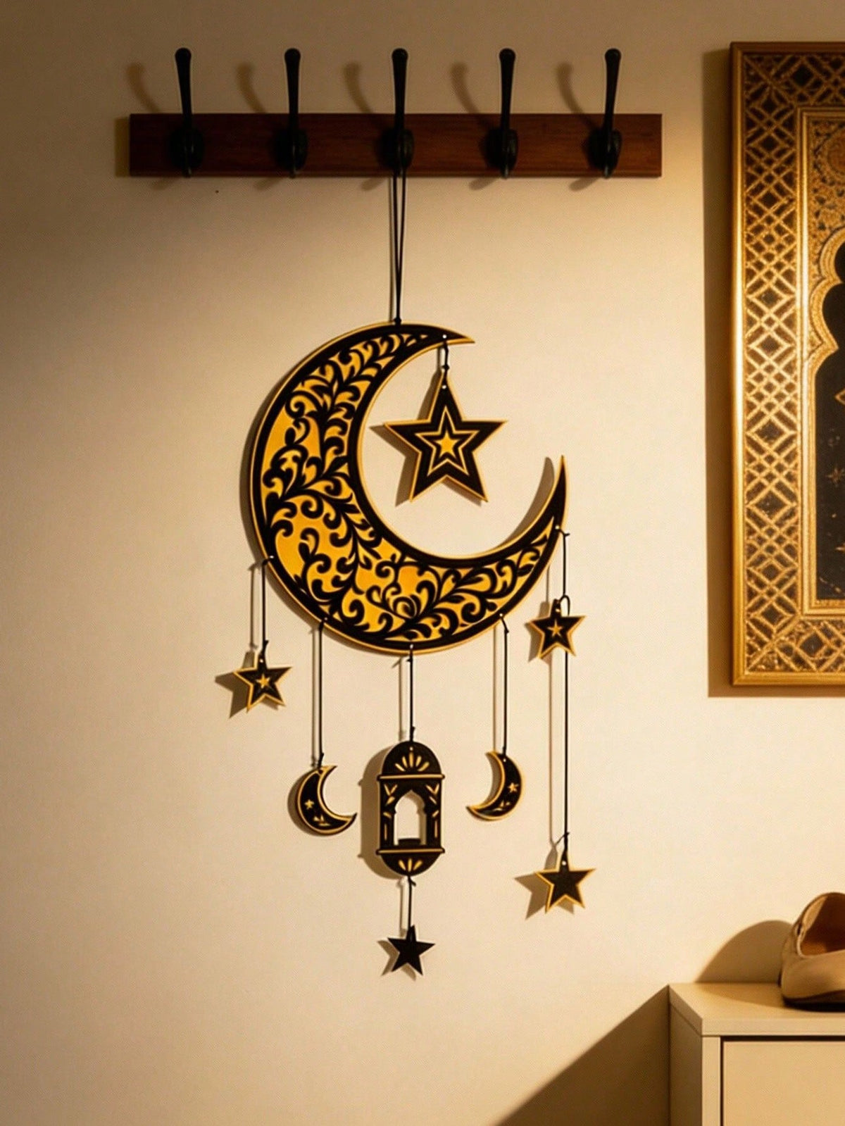 crescent moon lantern vine wall hanging styled in a room, photo 9