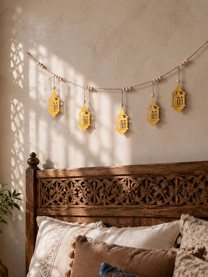 gold filigree lantern garland styled in a room, photo 9