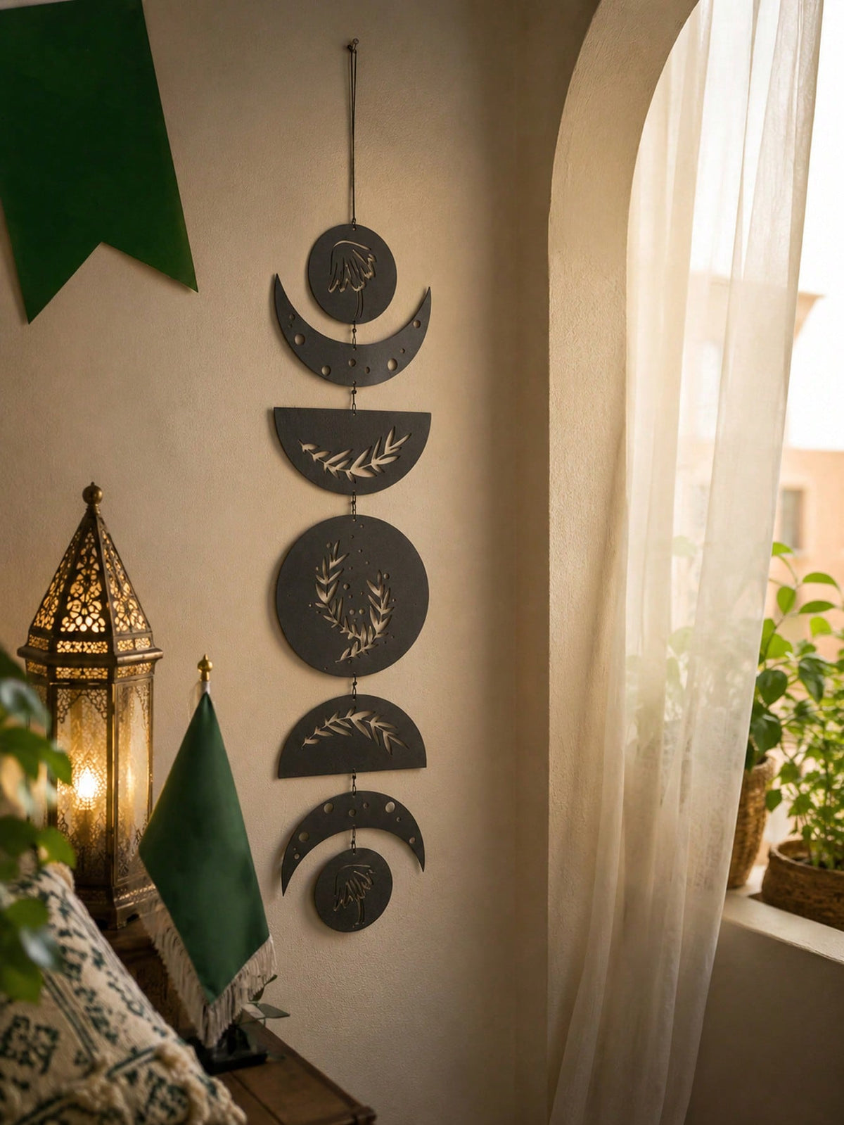 moon phase olive branch wall hanging styled in a room, photo 7