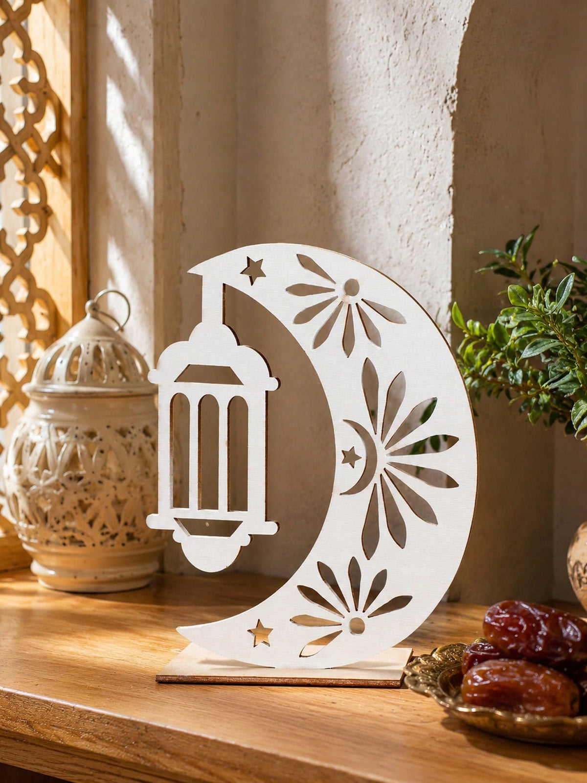 crescent moon and lantern tabletop decor styled in a room, photo 3