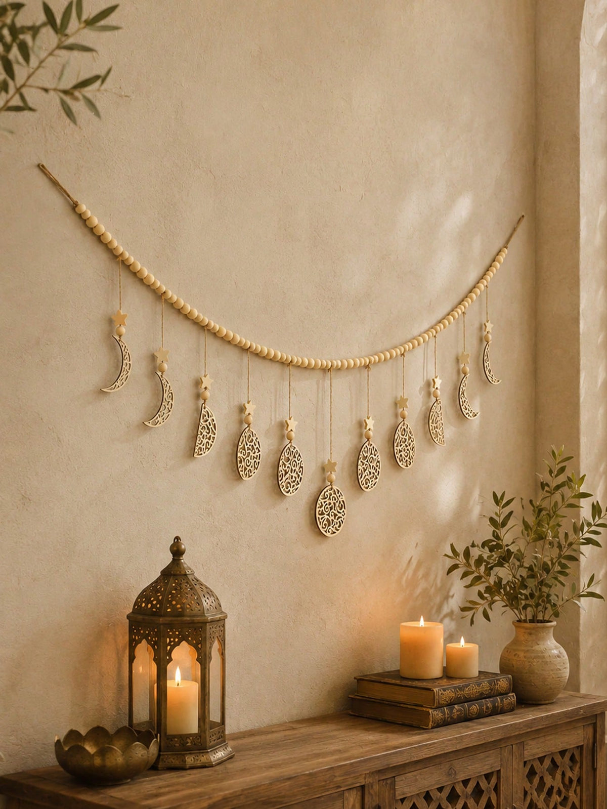 beaded filigree crescent moon garland styled in a room, photo 3
