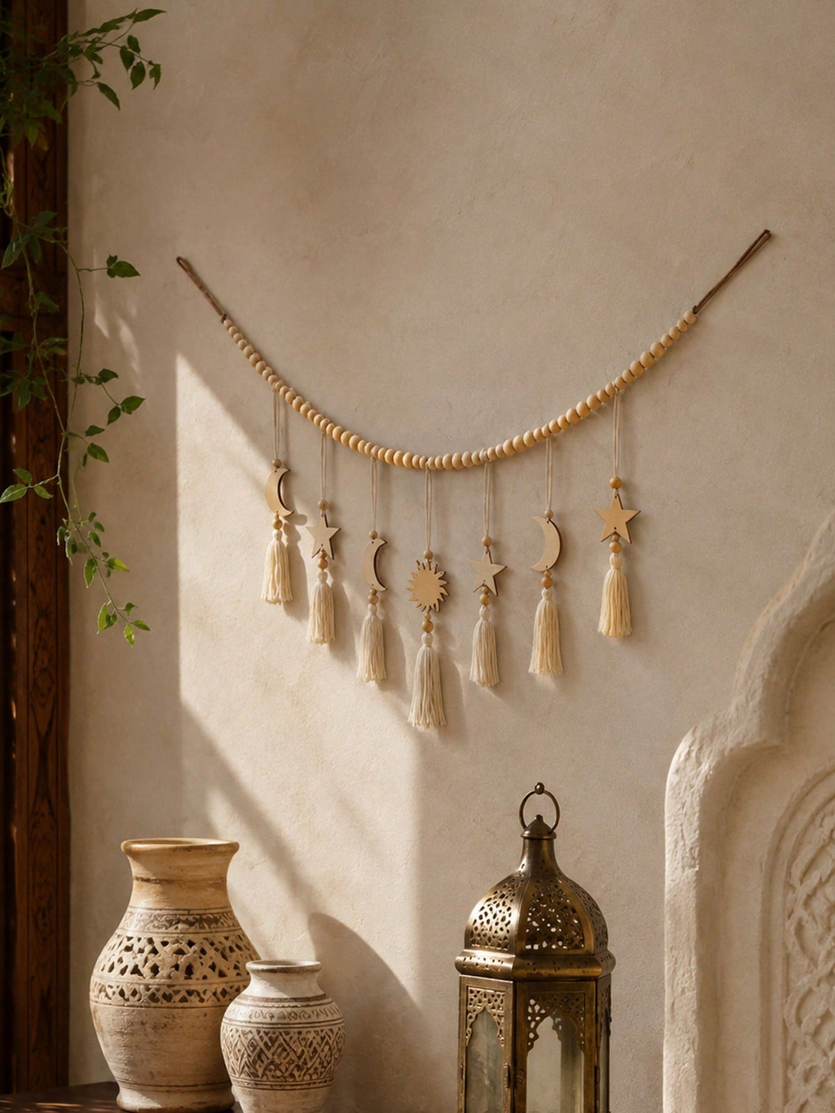 crescent moon sun and star tassel garland styled in a room, photo 3