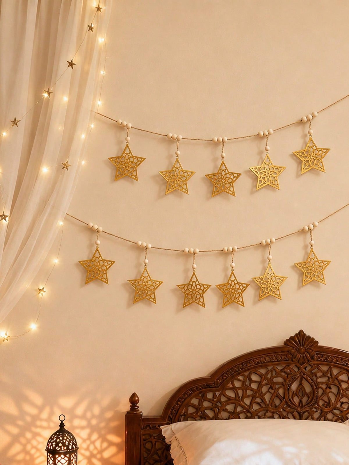 gold cutout star garland styled in a room, photo 2