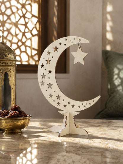 crescent moon tabletop decor with hanging star styled in a room, photo 3