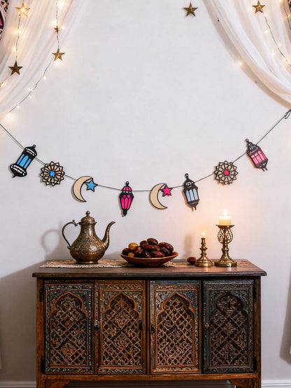 lantern crescent and star garland styled in a room, photo 4