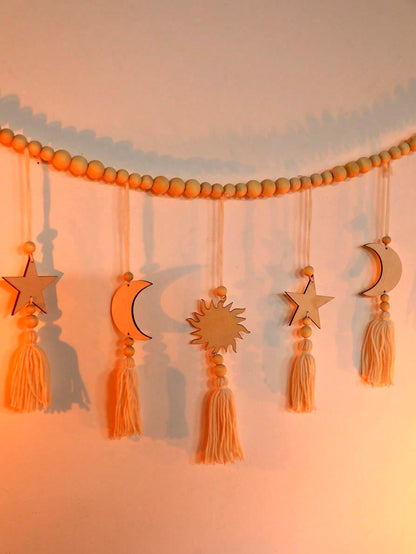 crescent moon sun and star tassel garland styled in a room, photo 4