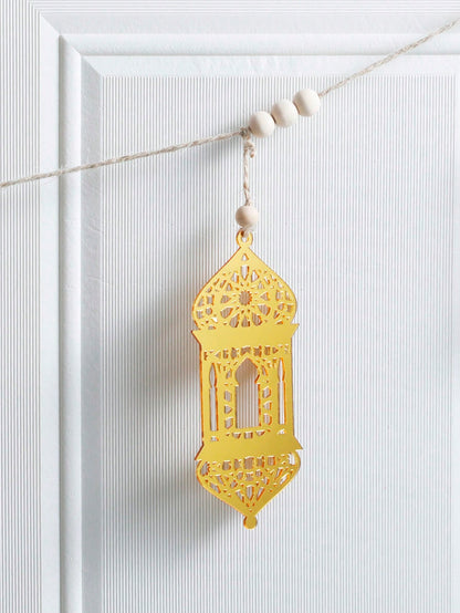 gold geometric lantern garland styled in a room, photo 4