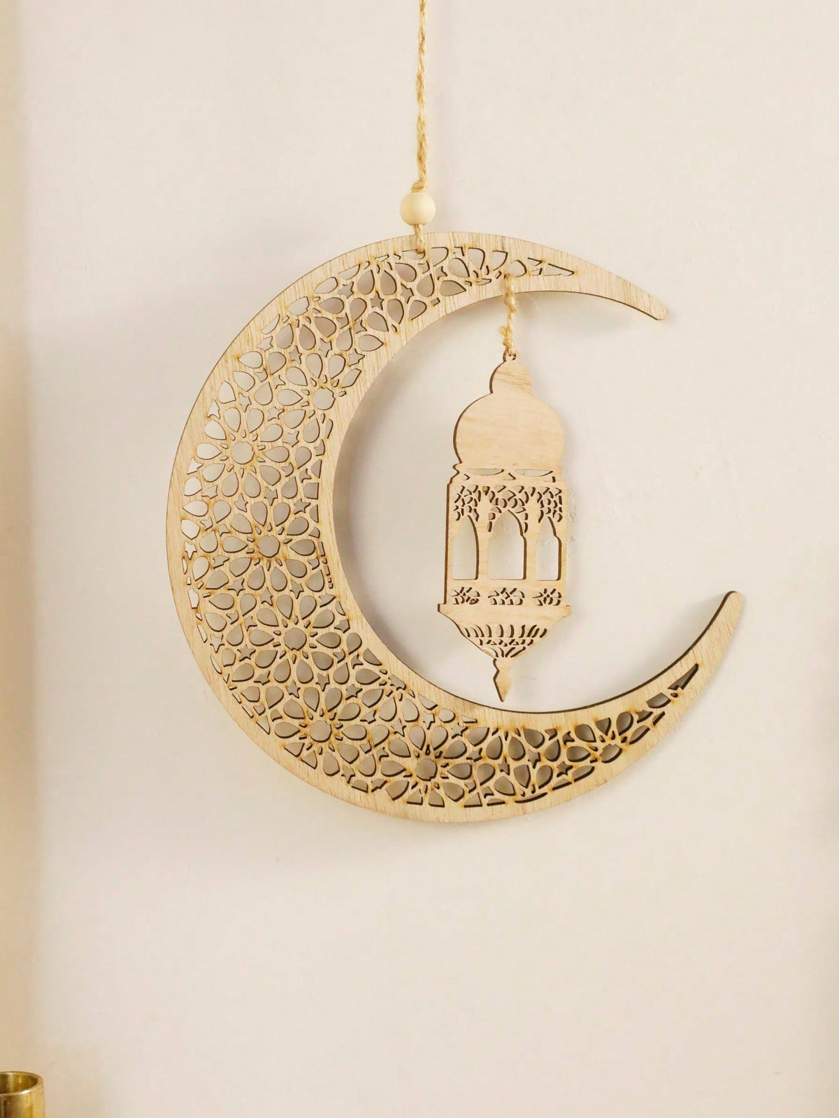 floral crescent moon and lantern wall hanging styled in a room, photo 5