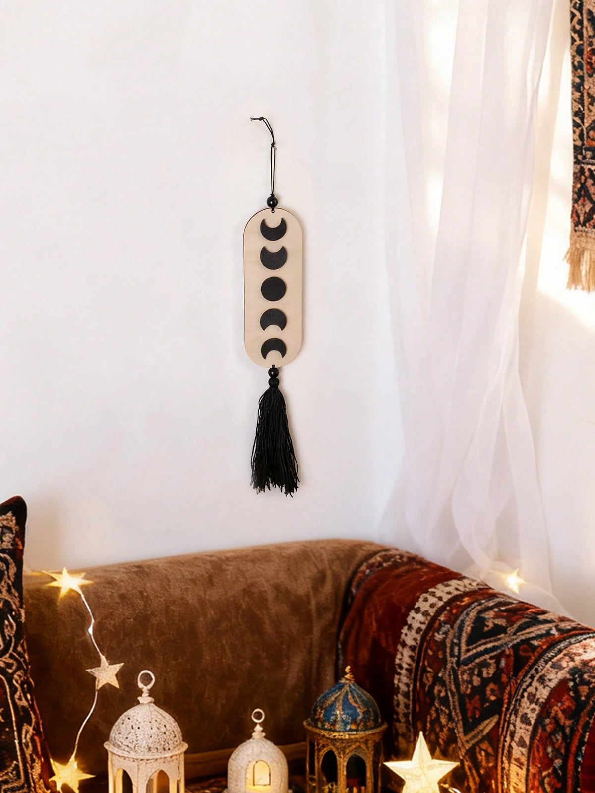 crescent moon phase tassel wall hanging styled in a room, photo 5