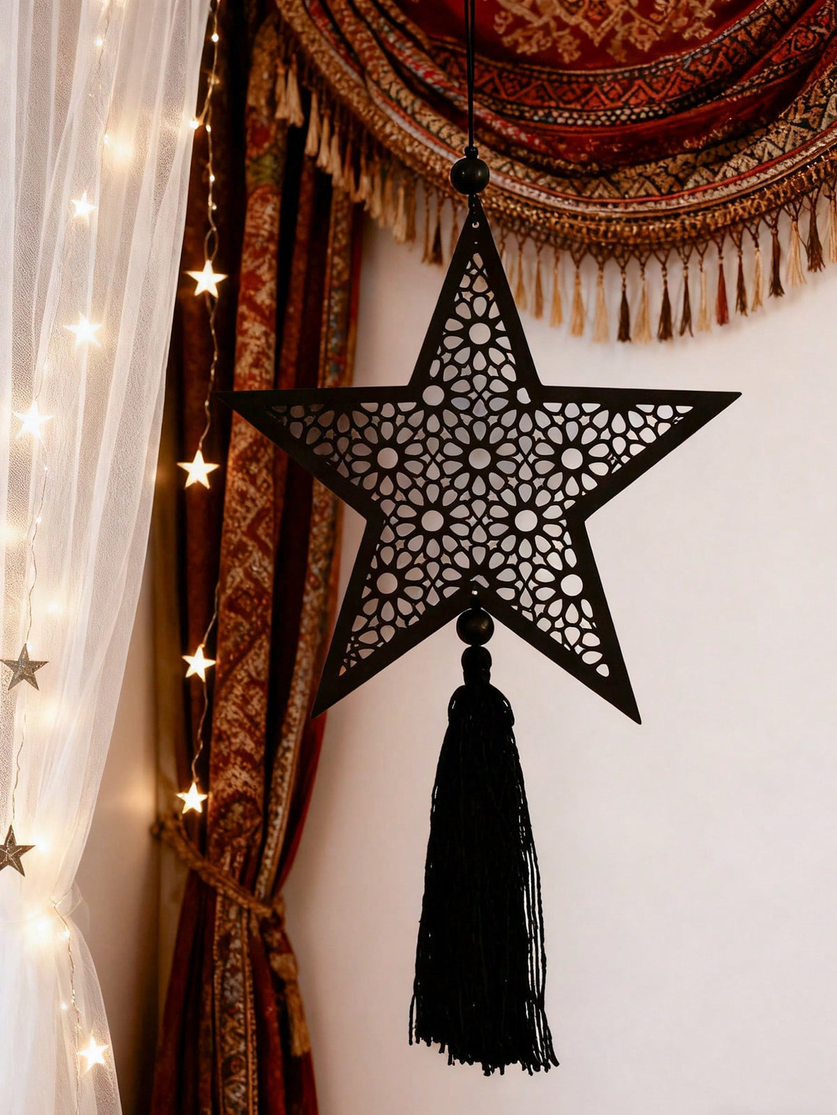 filigree star tassel wall hanging styled in a room, photo 4