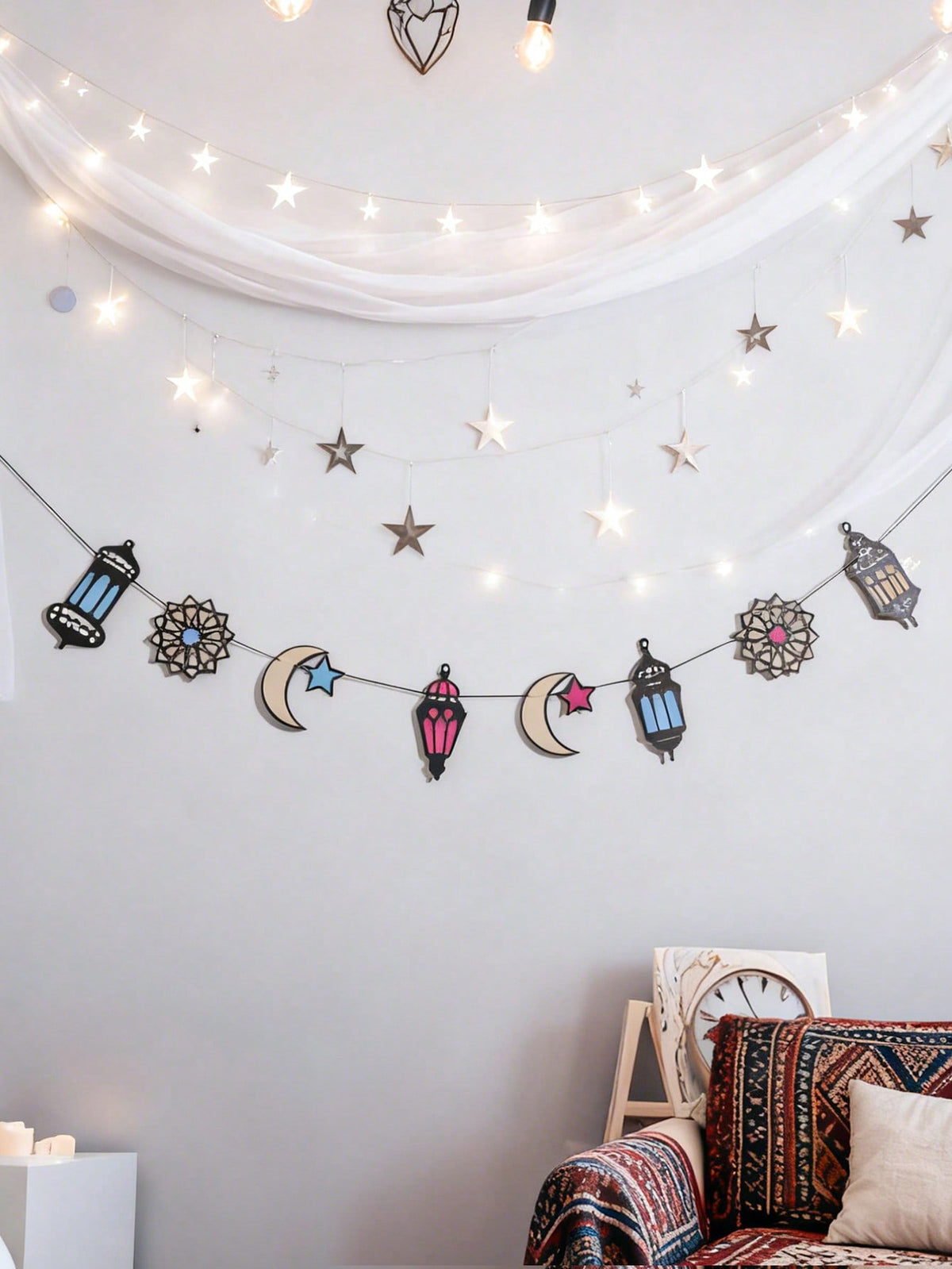 lantern crescent and star garland styled in a room, photo 5