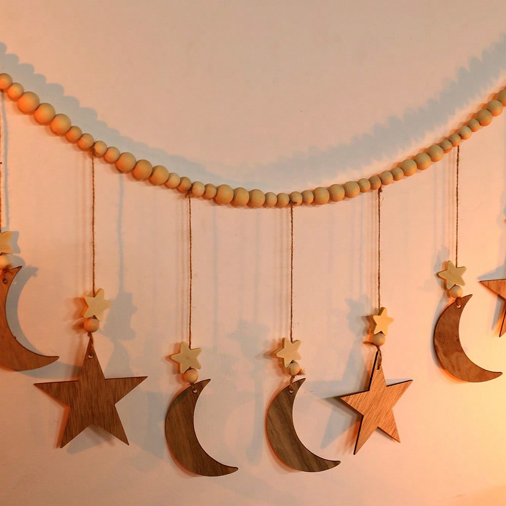 moon and star beaded garland styled in a room, photo 5