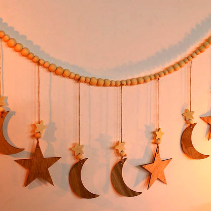 moon and star beaded garland styled in a room, photo 5