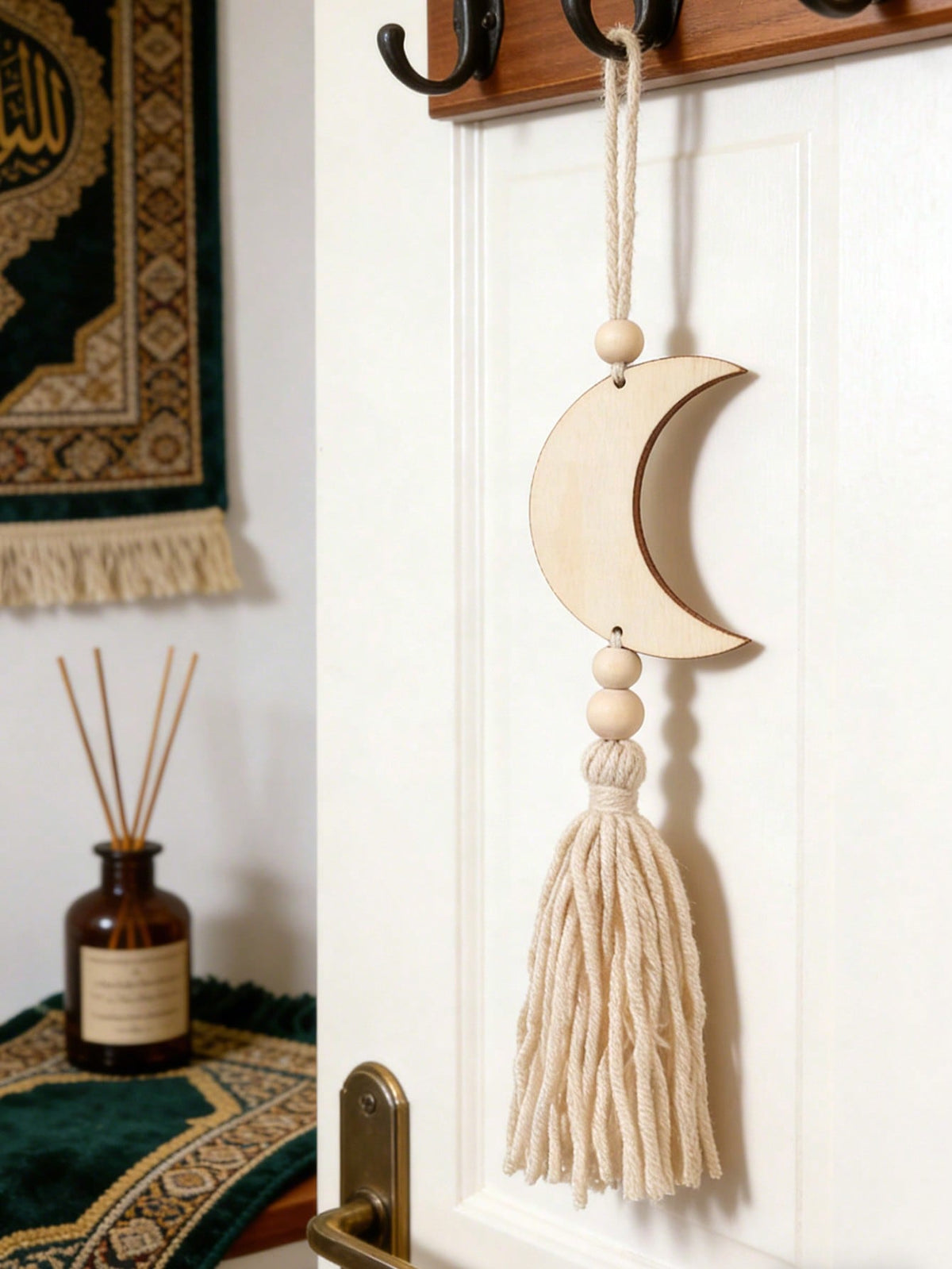 crescent moon and star tassel wall hanging styled in a room, photo 4