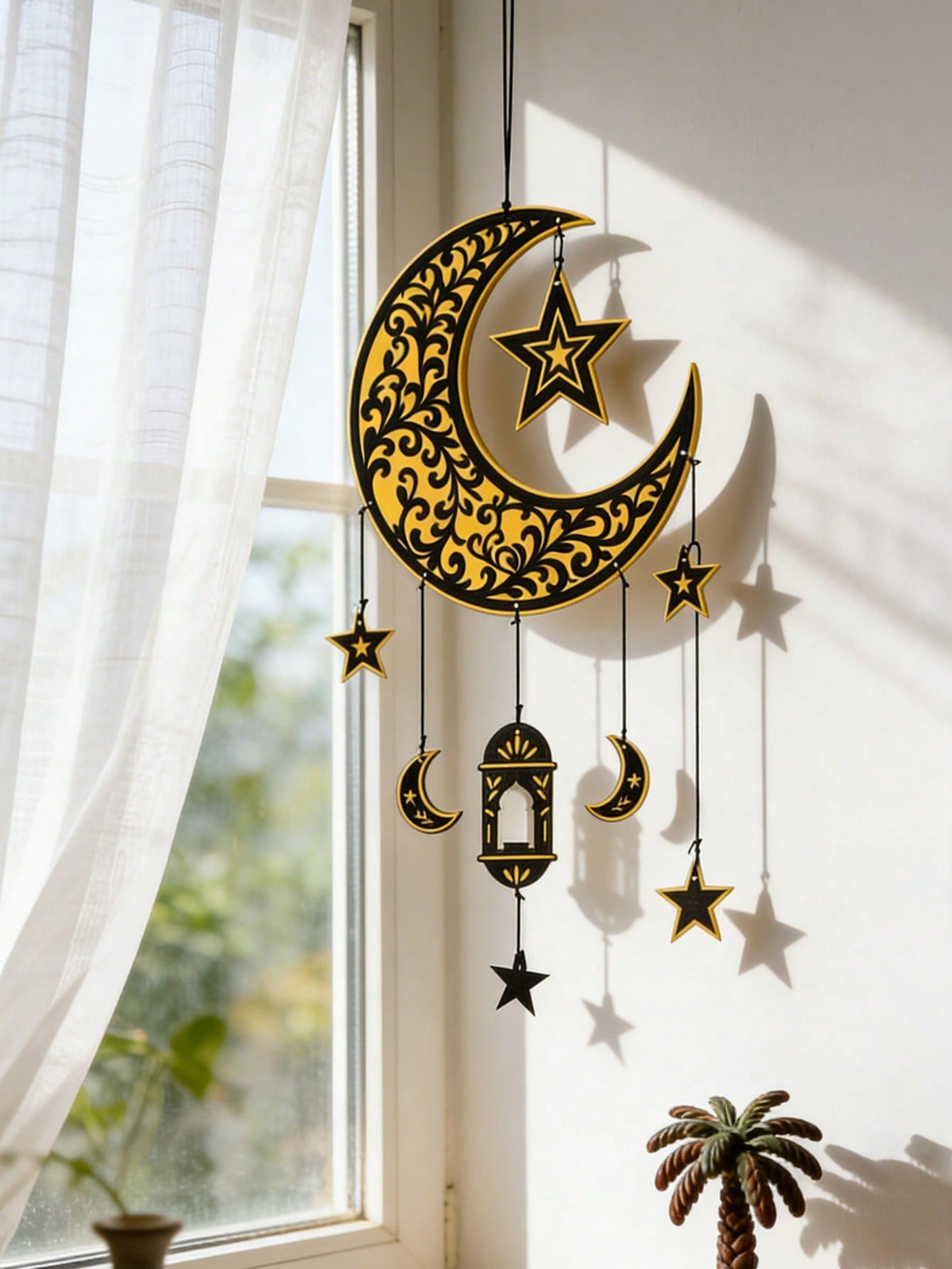 crescent moon lantern vine wall hanging styled in a room, photo 5