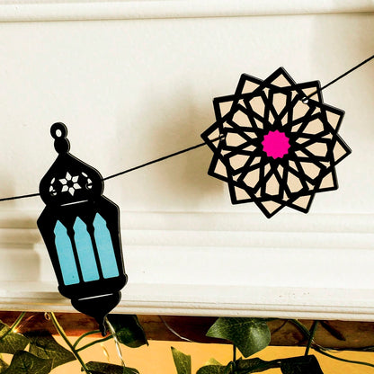lantern crescent and star garland styled in a room, photo 6