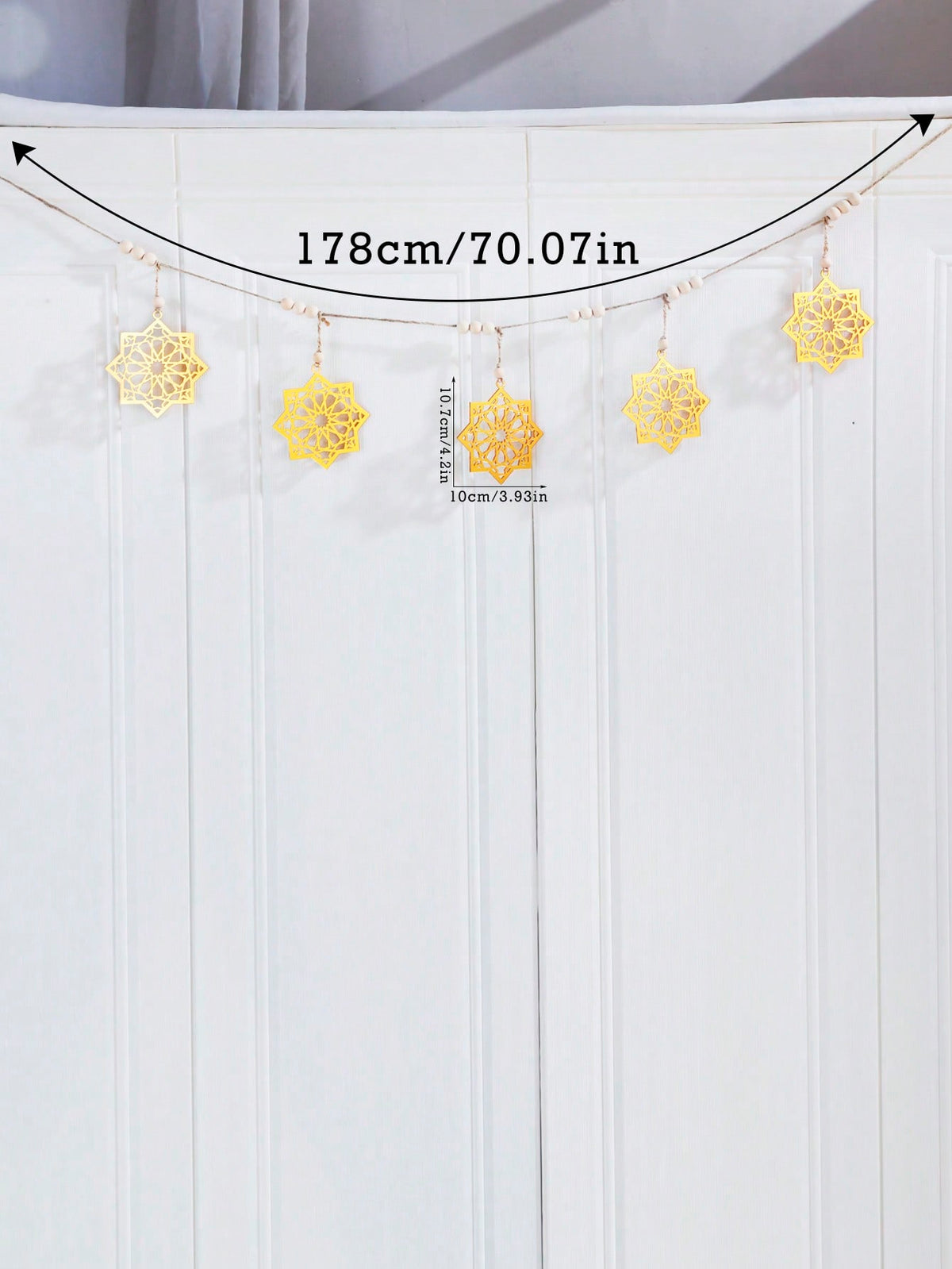 gold eight-point star garland size and details, photo 12
