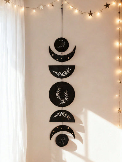 moon phase olive branch wall hanging styled in a room, photo 4