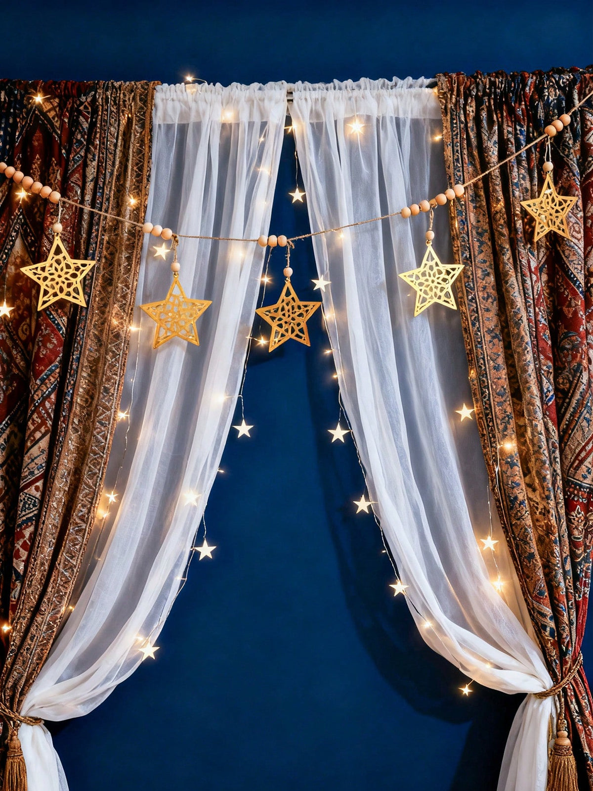 gold cutout star garland styled in a room, photo 6
