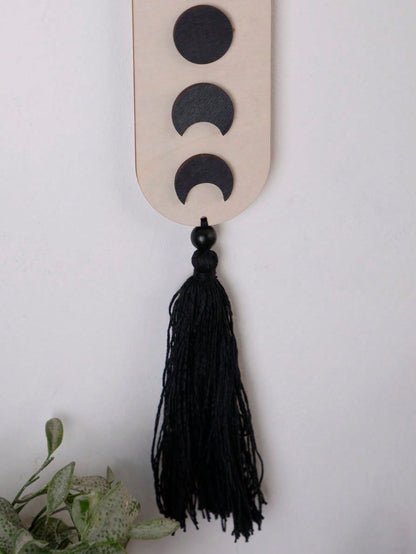 crescent moon phase tassel wall hanging styled in a room, photo 7