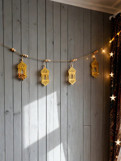 gold geometric lantern garland styled in a room, photo 7