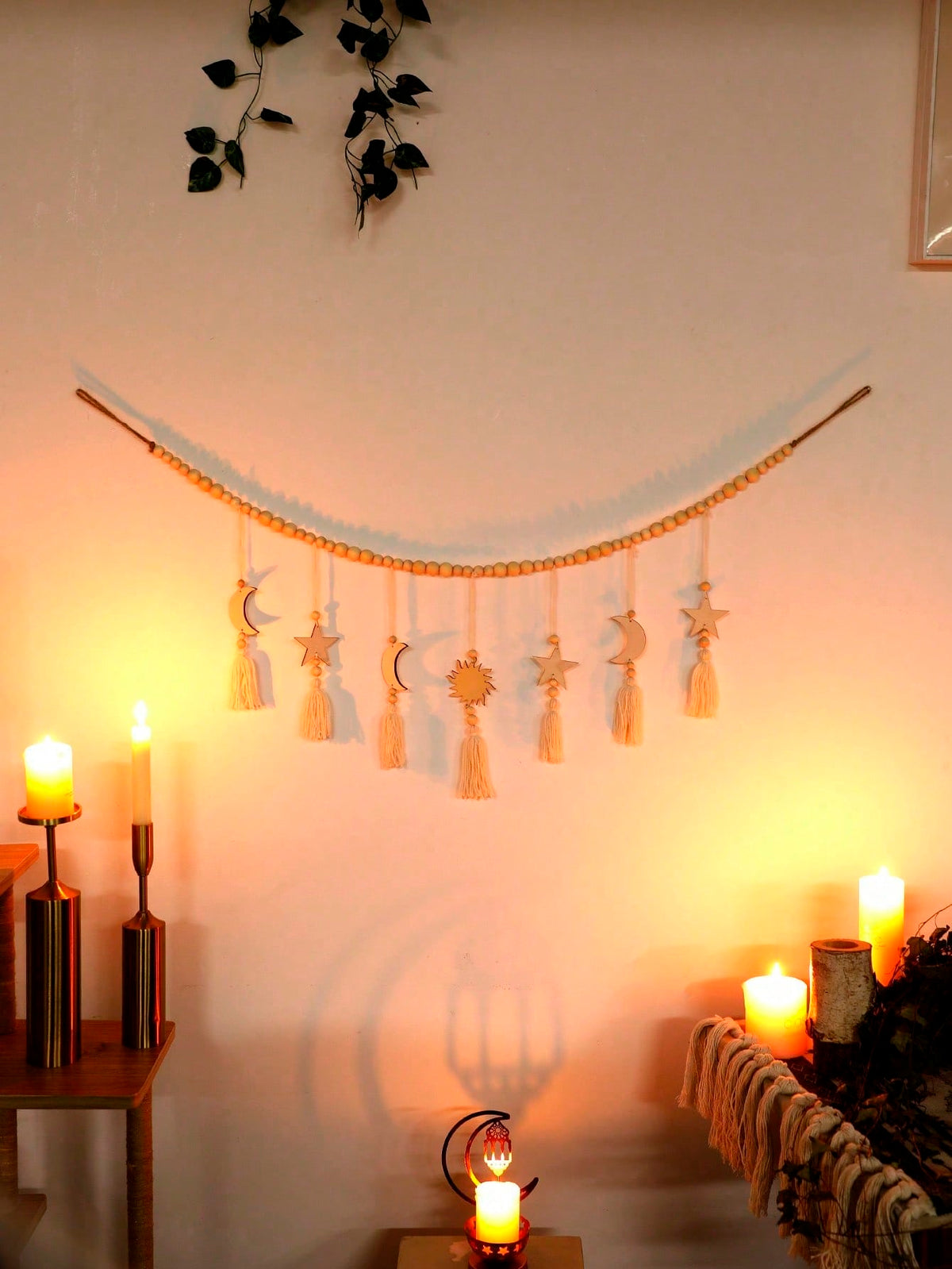 crescent moon sun and star tassel garland styled in a room, photo 6