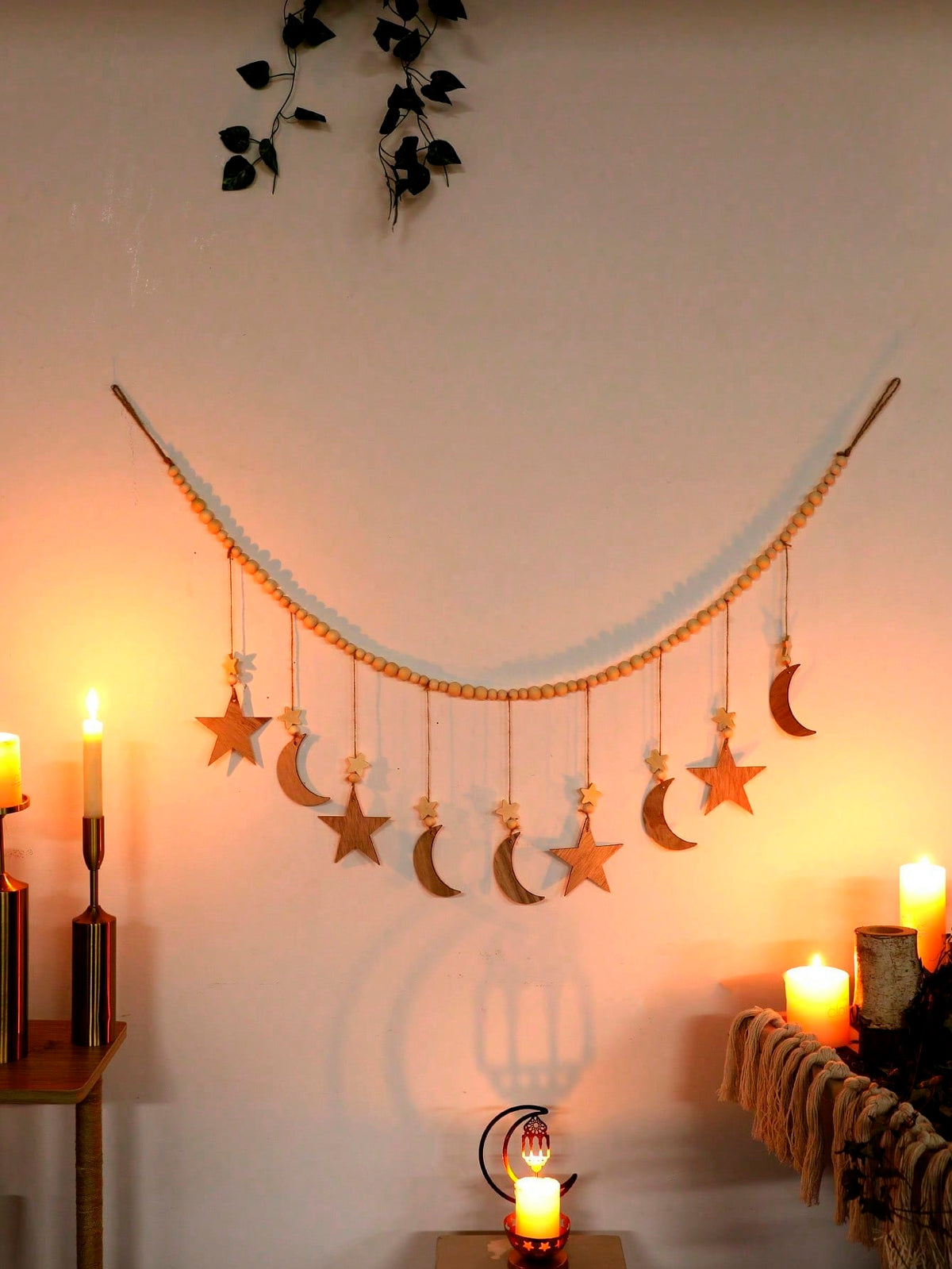moon and star beaded garland styled in a room, photo 6