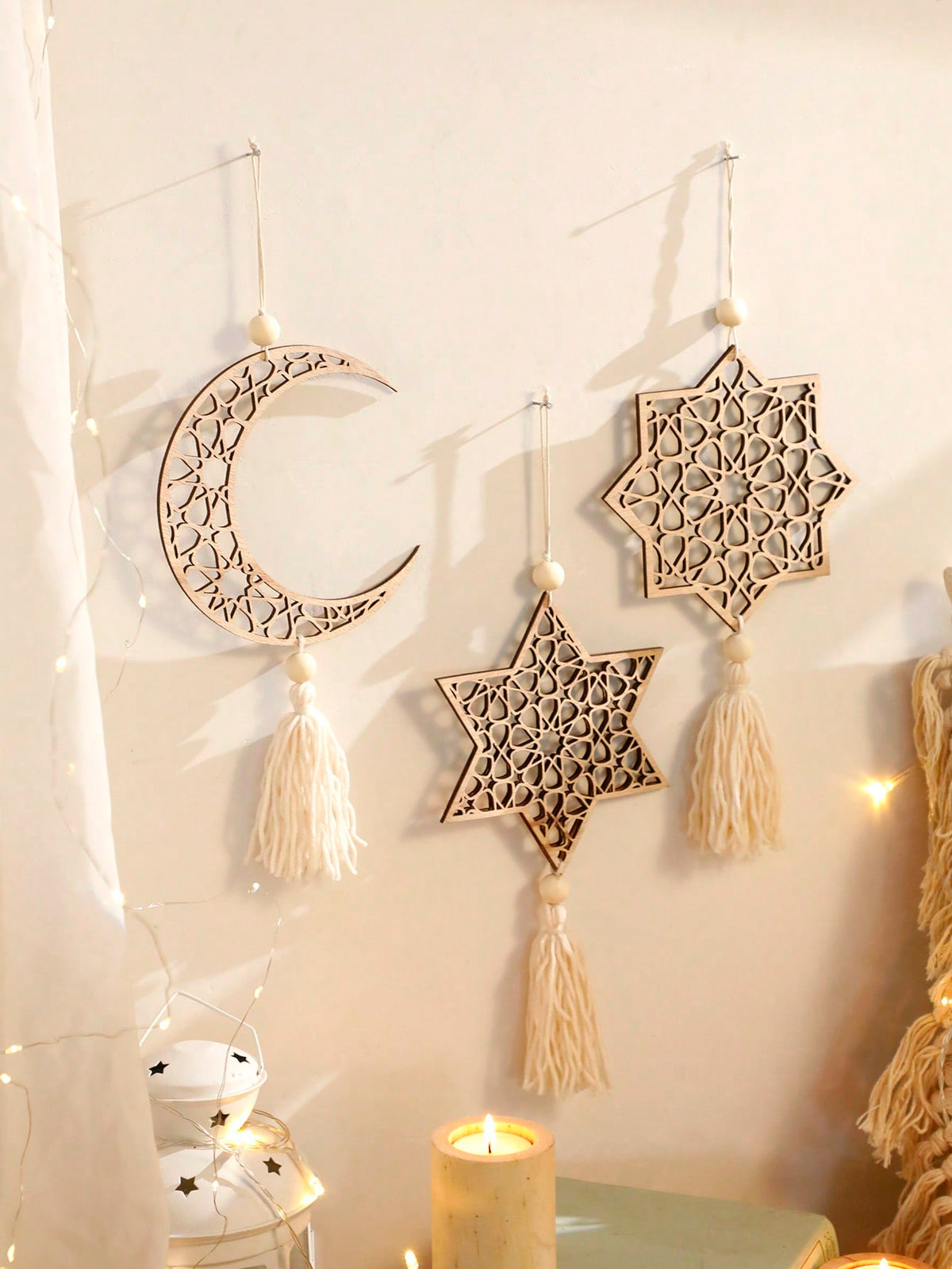 crescent moon and geometric star tassel hanging styled in a room, photo 6