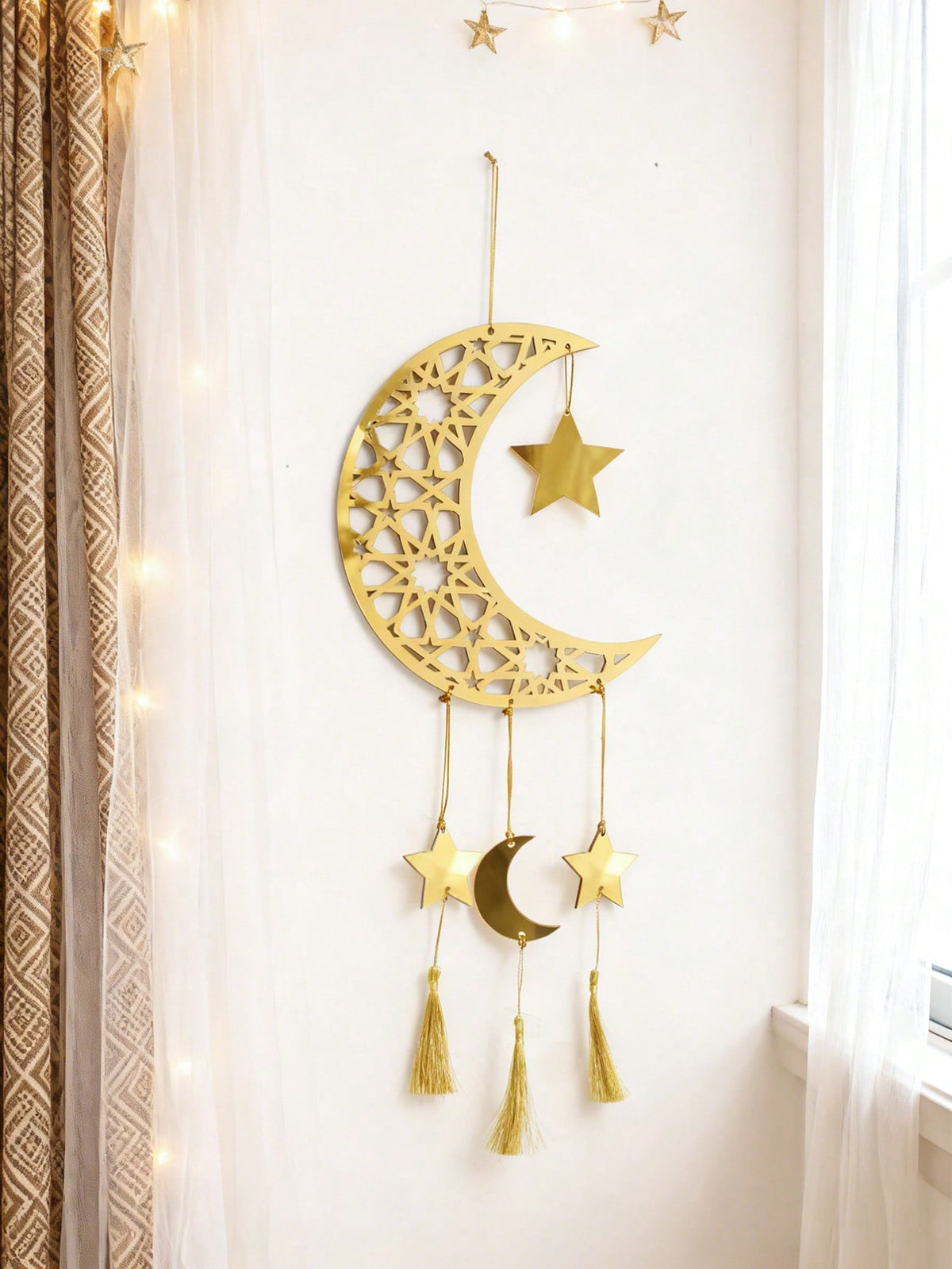 crescent moon star wall hanging with tassels styled in a room, photo 7