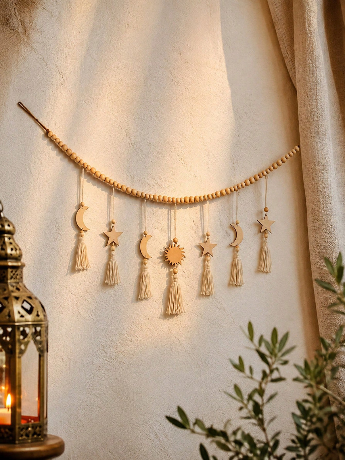 crescent moon sun and star tassel garland styled in a room, photo 8