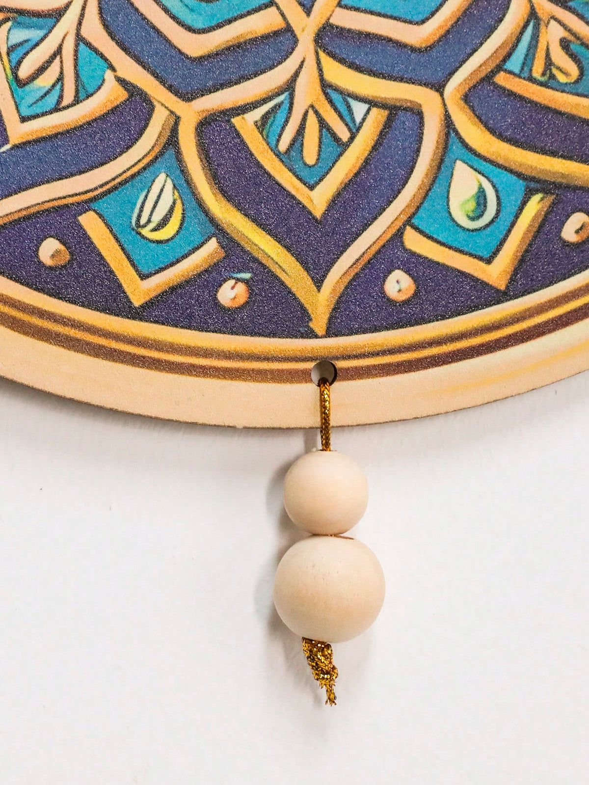 geometric star and crescent hanging ornaments styled in a room, photo 7