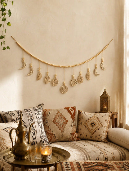 beaded filigree crescent moon garland styled in a room, photo 7