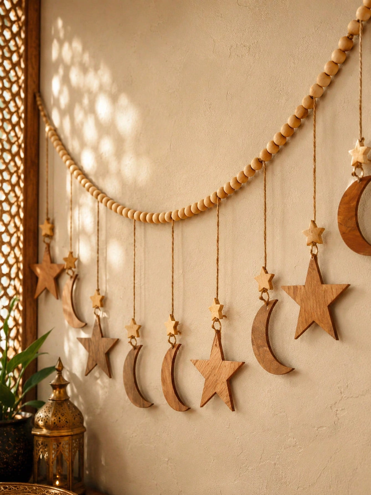 moon and star beaded garland styled in a room, photo 7
