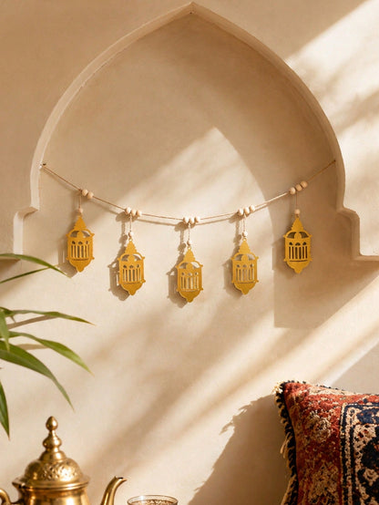 gold filigree lantern garland styled in a room, photo 8