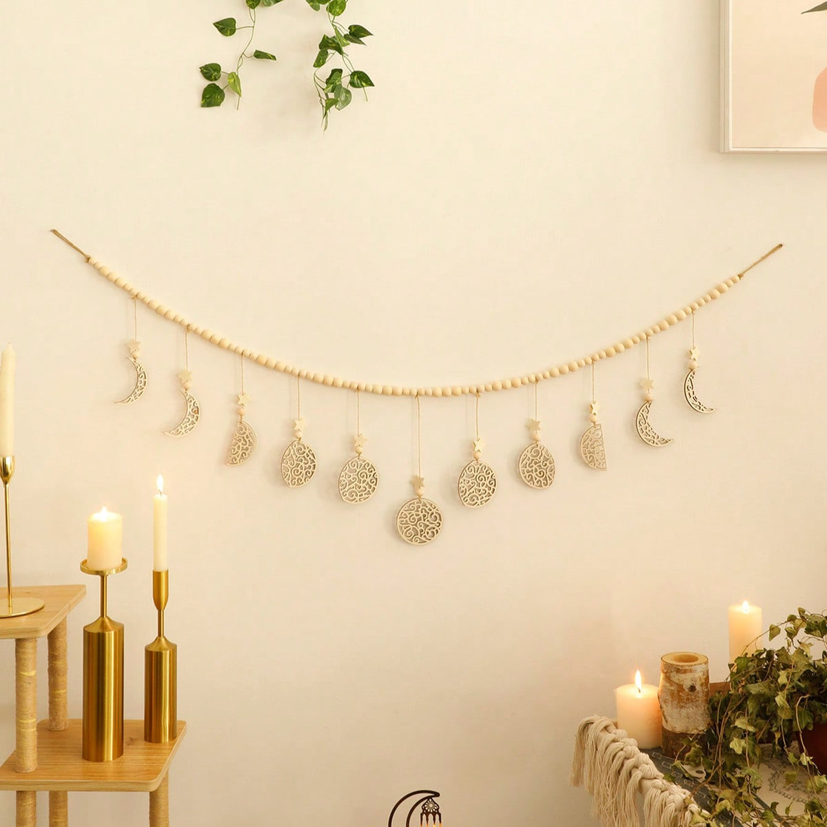 beaded filigree crescent moon garland styled in a room, photo 2