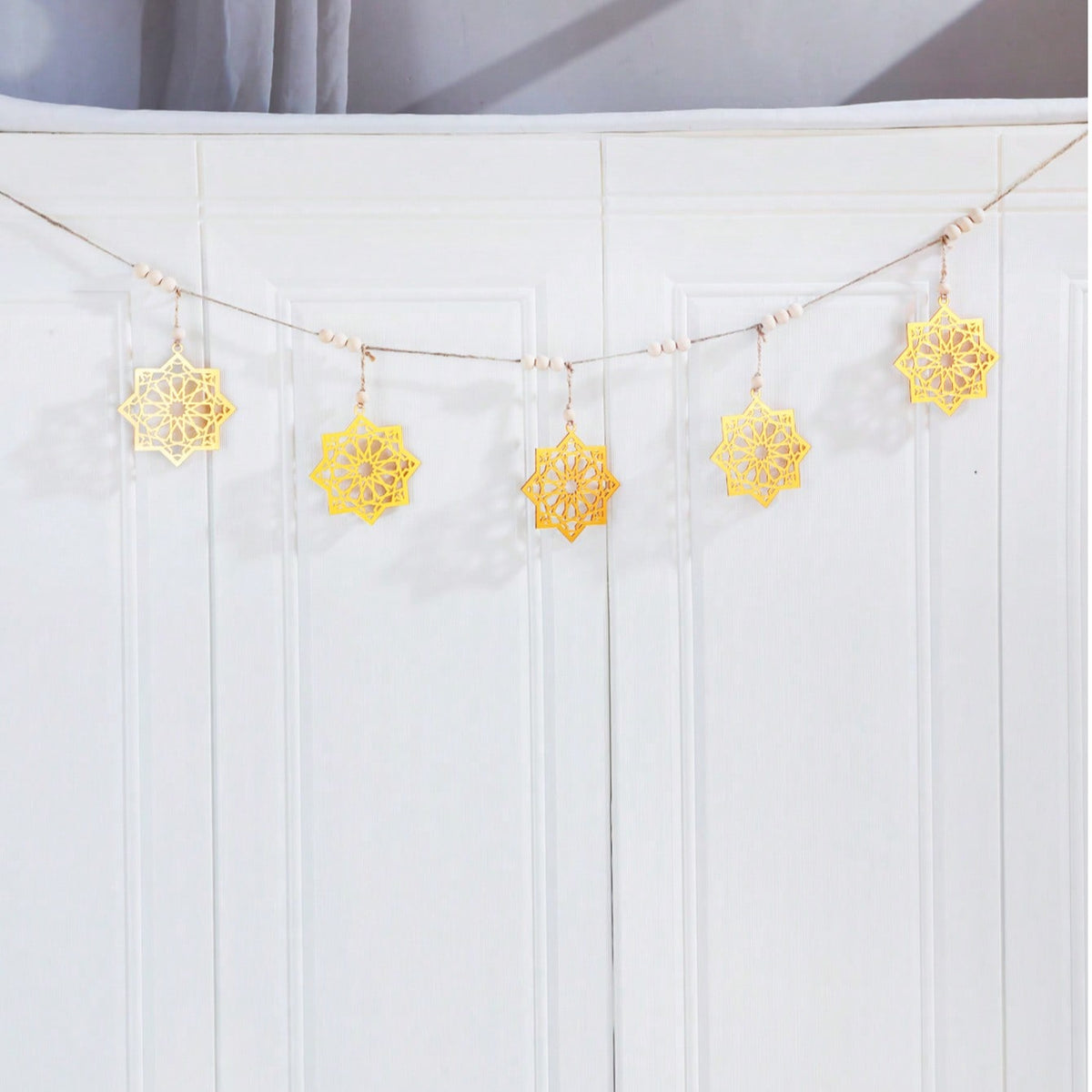 gold eight-point star garland size and details, photo 10