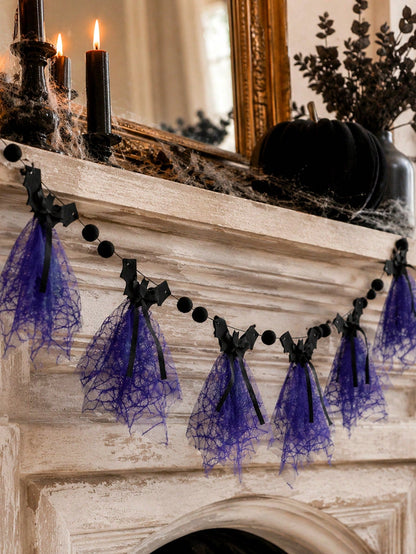 Purple bat Halloween banner on a rustic mantel