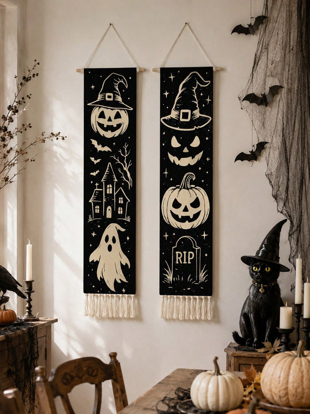 Vintage Halloween tassel wall hanging pair on a wall with black cat decor