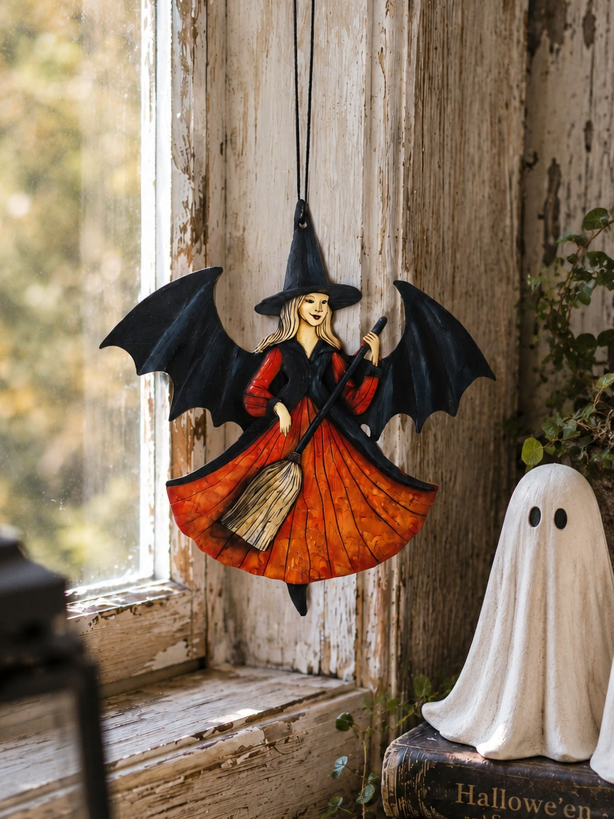 witch on broom hanging decor - main photo