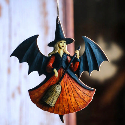 witch on broom hanging decor - styled photo