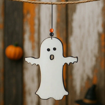 white ghost hanging decor - styled photo