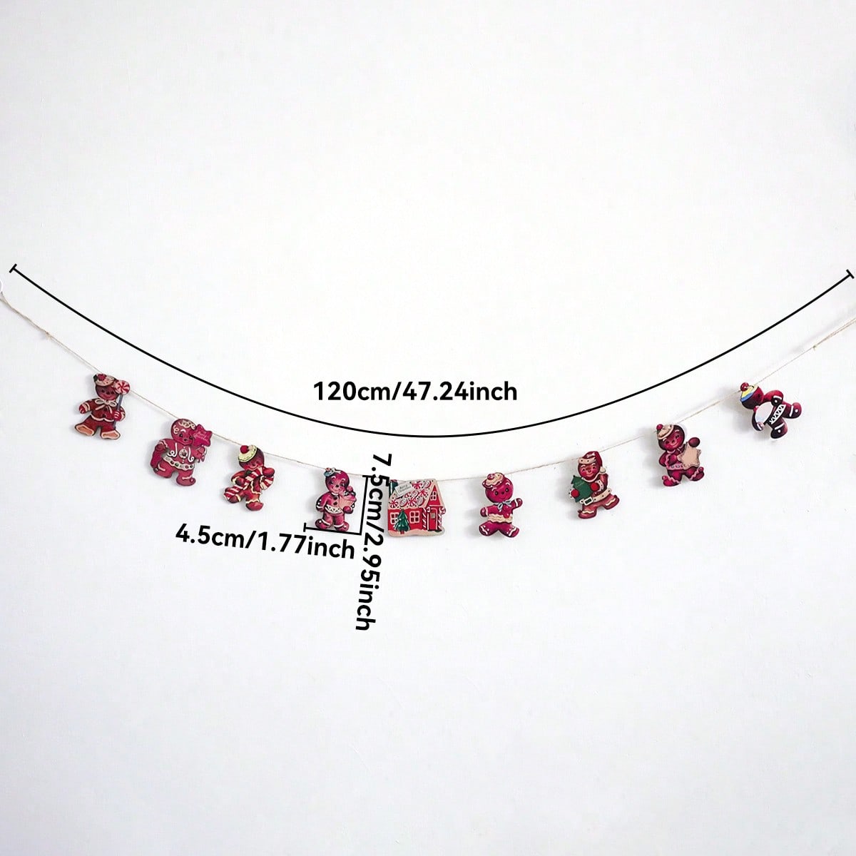 pink gingerbread house garland - styled photo