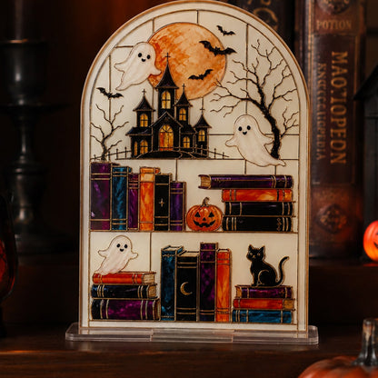 haunted house bookshelf Halloween sign - styled photo