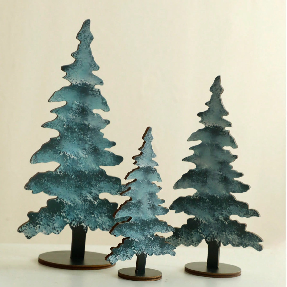 frosted blue pine tree tabletop - styled photo