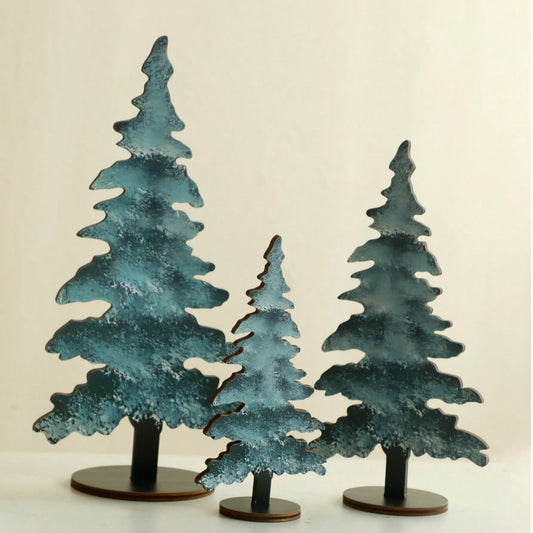 frosted blue pine tree tabletop - styled photo