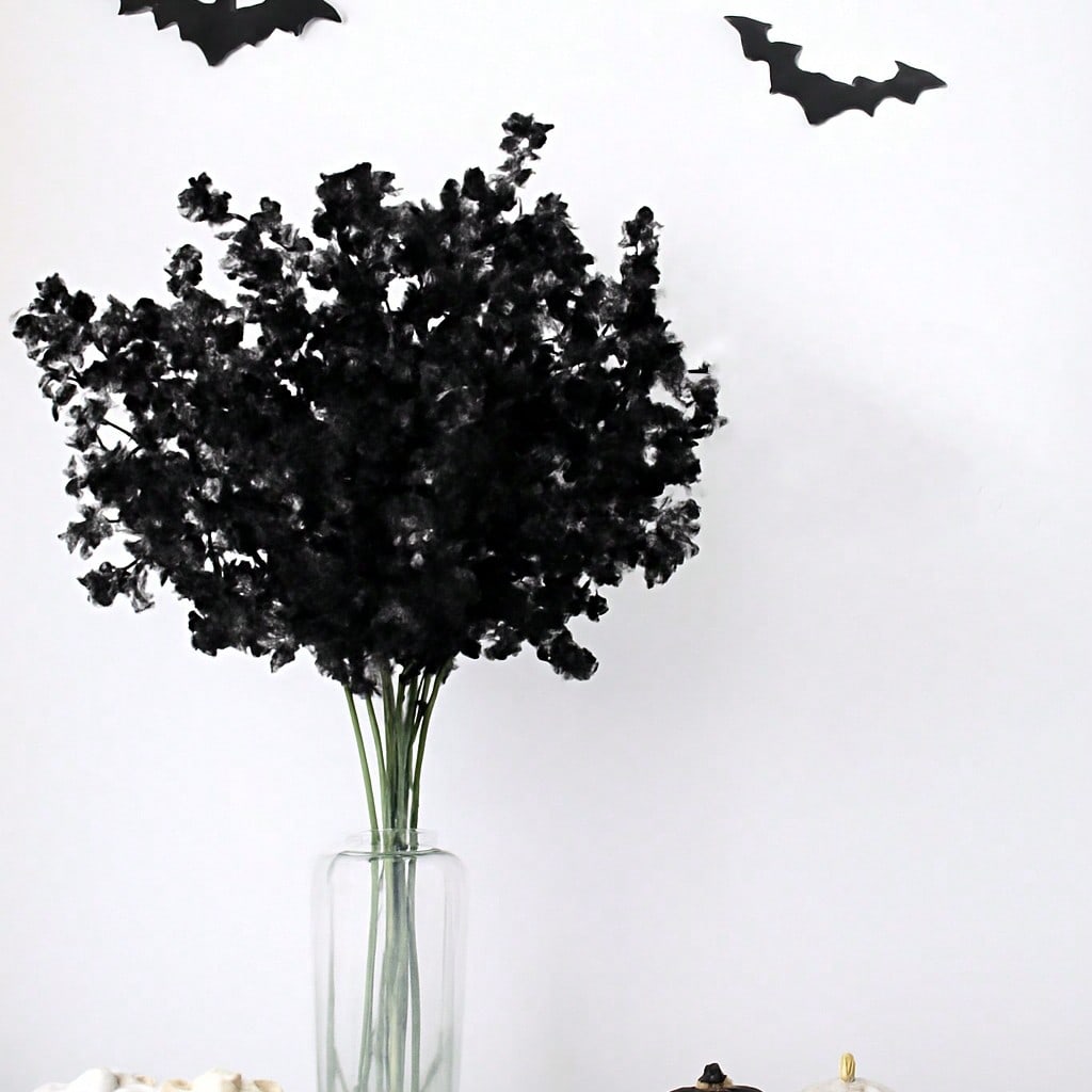 black artificial greenery Halloween - styled photo