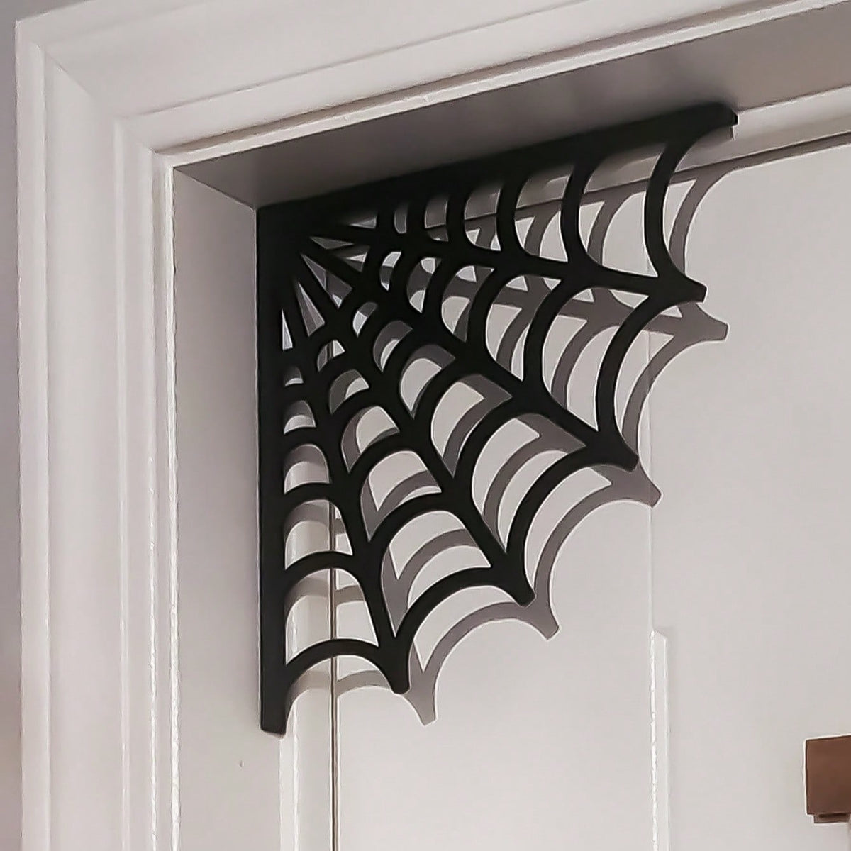 spider web door corner decor - styled photo