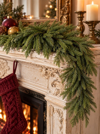 Artificial cedar Christmas swag draped over a mantel with stocking