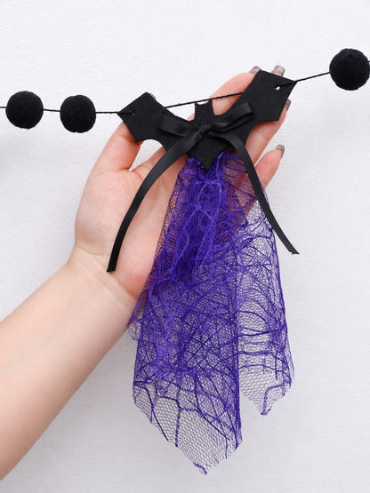 Purple bat Halloween banner bat piece with purple tulle held in hand